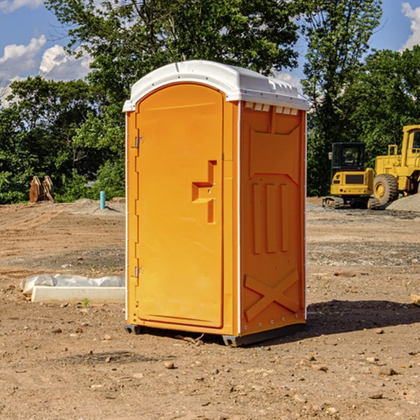 how often are the portable restrooms cleaned and serviced during a rental period in Louisville Illinois